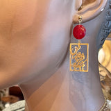 Unique Stainless Golden Earrings with a Beautiful Calligraphy and Ruby Bead